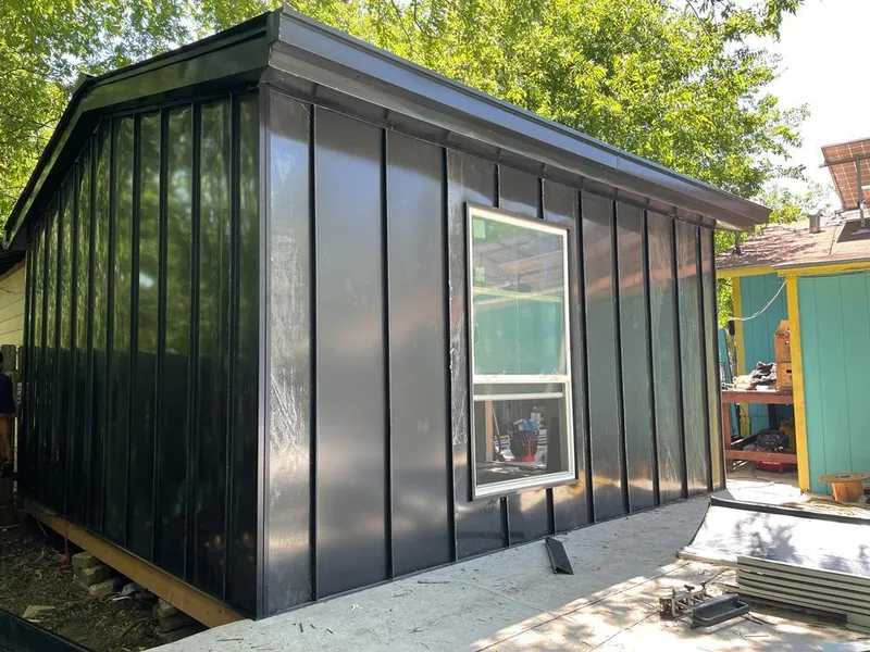 Black standing seam metal wall panels for Metal Roof Installation in South Ogden